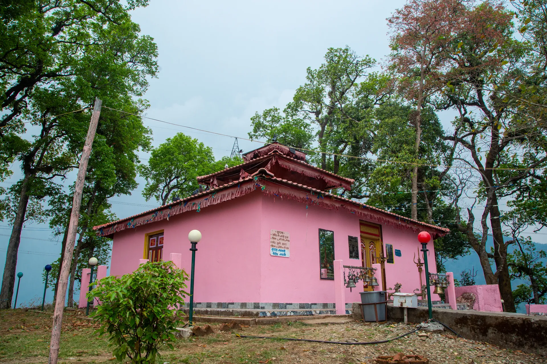 Temple building among trees near the resort